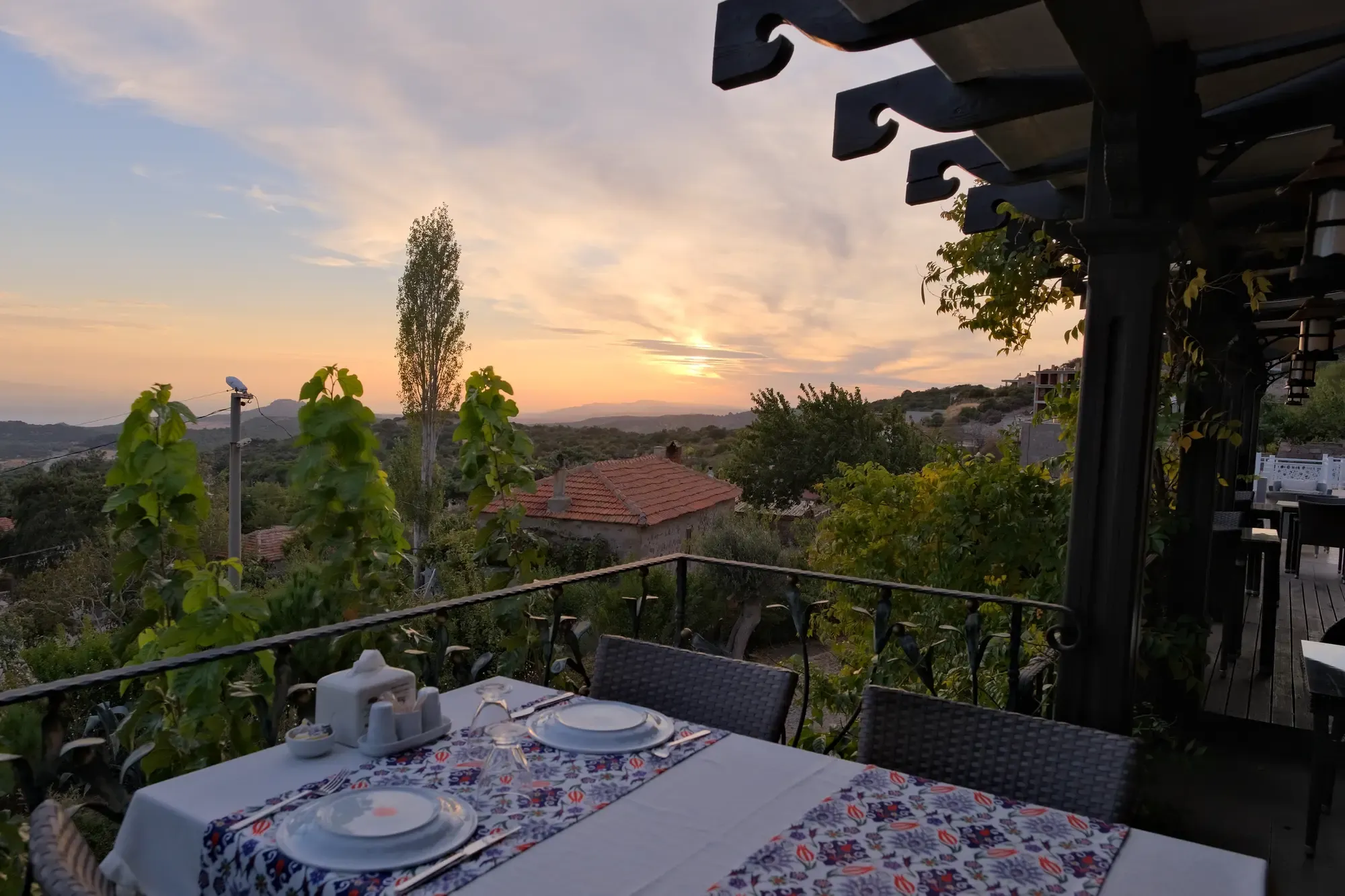Table set on the terrace at sunset