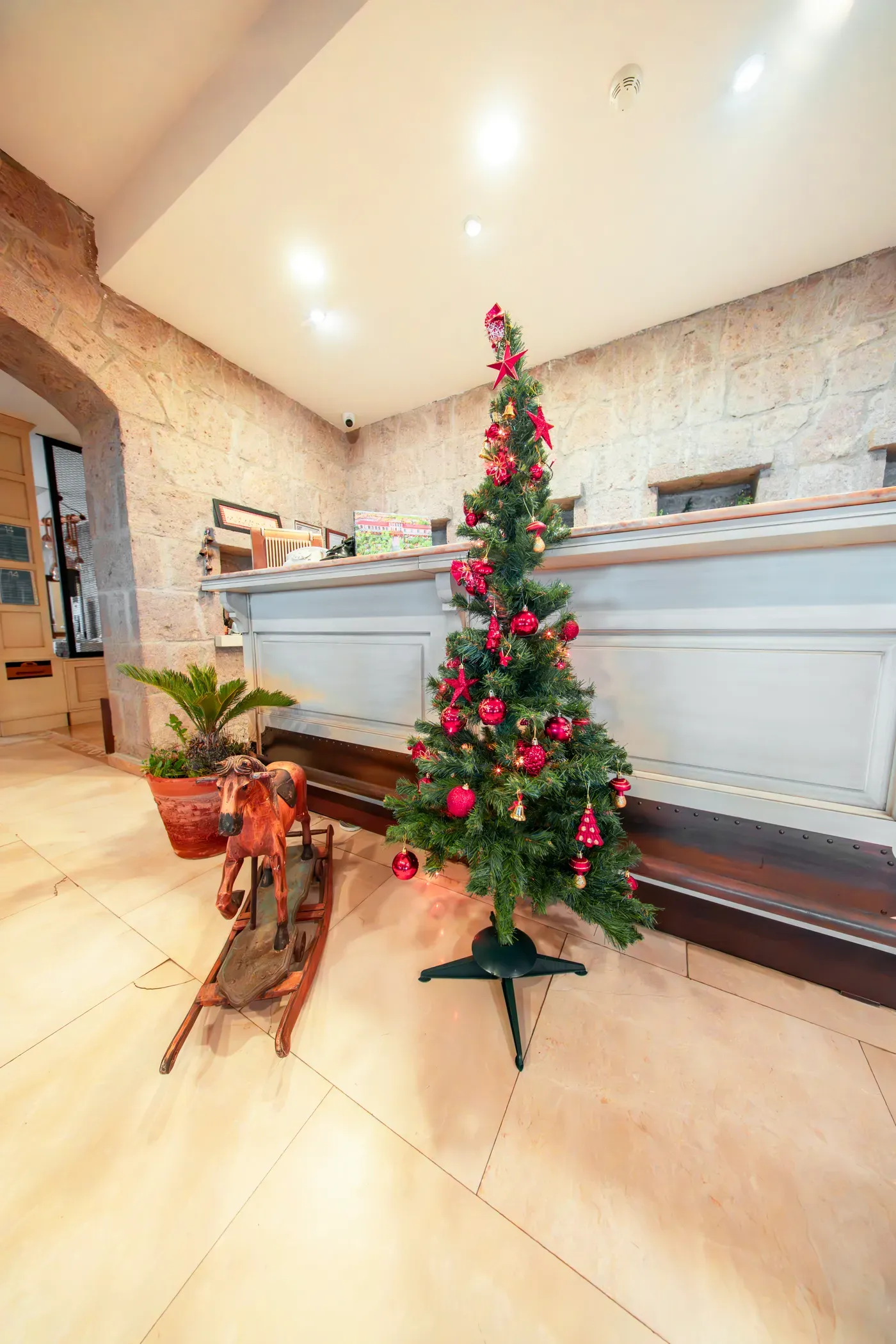 Decorated New Year tree by the reception desk